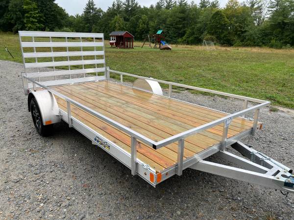 MULTI -­­USE MOTORCYCLE TRAILERS: