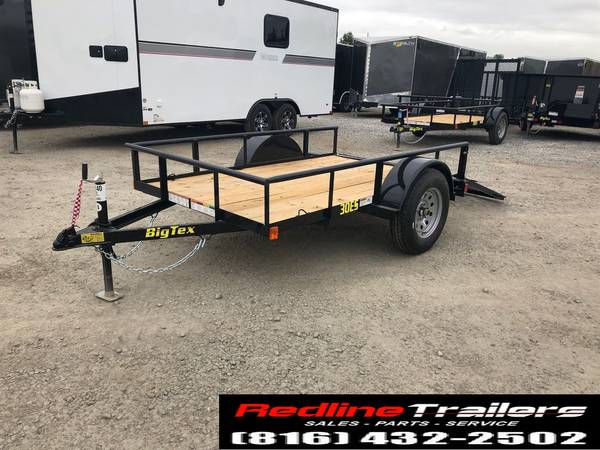 MULTI -­­USE MOTORCYCLE TRAILERS: