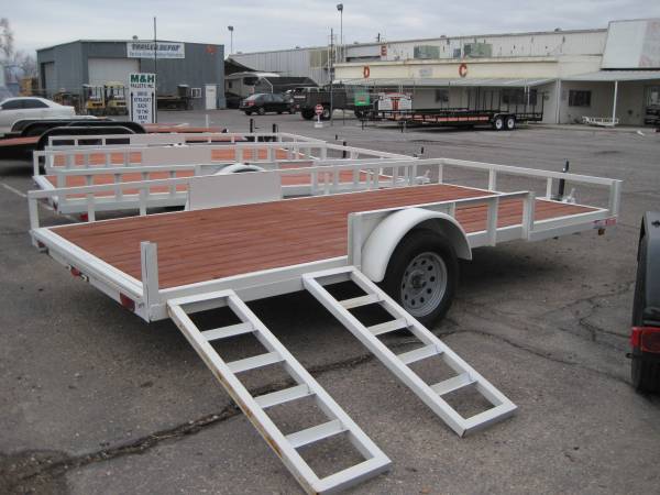 MULTI -­­USE MOTORCYCLE TRAILERS: